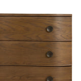 Featuring Tiago Toasted Oak Nightstand by Four Hands at Amethyst Home. Made from solid oak and finished in a toasted oak, this three-drawer nightstand is inspired by European antiques to bring both style and storage space to the bedroom. Overall Dimensions: 32.00"w x 21.75"d x 26.50"h. Amethyst Home provides interior design, new home construction design consulting, vintage area rugs, and lighting in the Boston metro area.