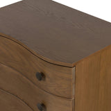 Featuring Tiago Toasted Oak Nightstand by Four Hands at Amethyst Home. Made from solid oak and finished in a toasted oak, this three-drawer nightstand is inspired by European antiques to bring both style and storage space to the bedroom. Overall Dimensions: 32.00"w x 21.75"d x 26.50"h. Amethyst Home provides interior design, new home construction design consulting, vintage area rugs, and lighting in the Salt Lake City metro area.