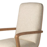 A classic silhouette is modernized with a cotton- and linen-blend performance fabric, then elevated with a top-grain leather back Amethyst Home provides interior design, new home construction design consulting, vintage area rugs, and lighting in the Kansas City metro area.