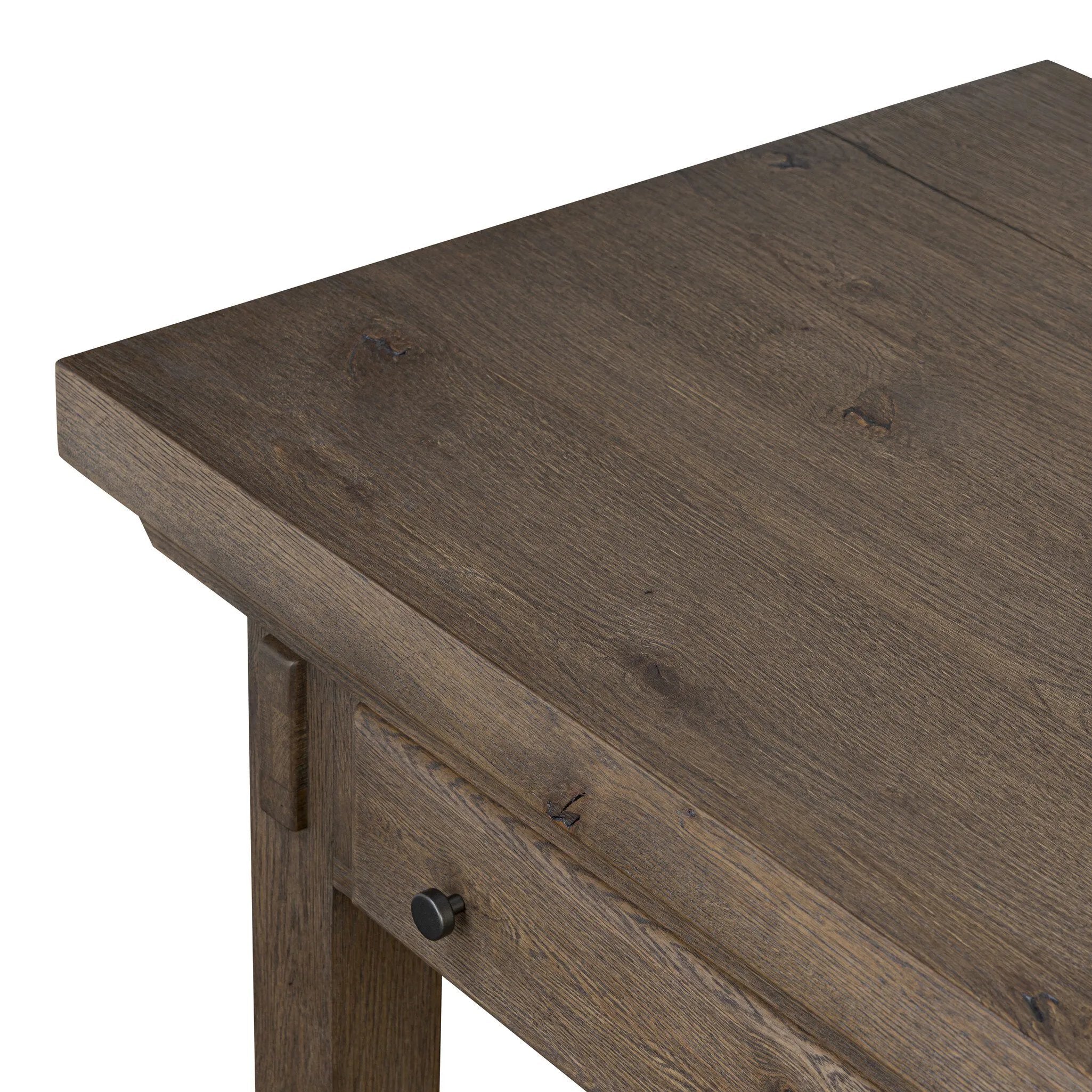 This butcher block-inspired island maximizes space with a streamlined design. Crafted from solid oak with beautiful graining throughout and iron accents. Features a thick tabletop, two drawers and a wide open shelf below.As fans of luxe design at Amethyst, we love the nature inspired Tobiah Kitchen Island. Amethyst Home provides interior design, new home construction design consulting, vintage area rugs, and lighting in the Kansas City metro area.