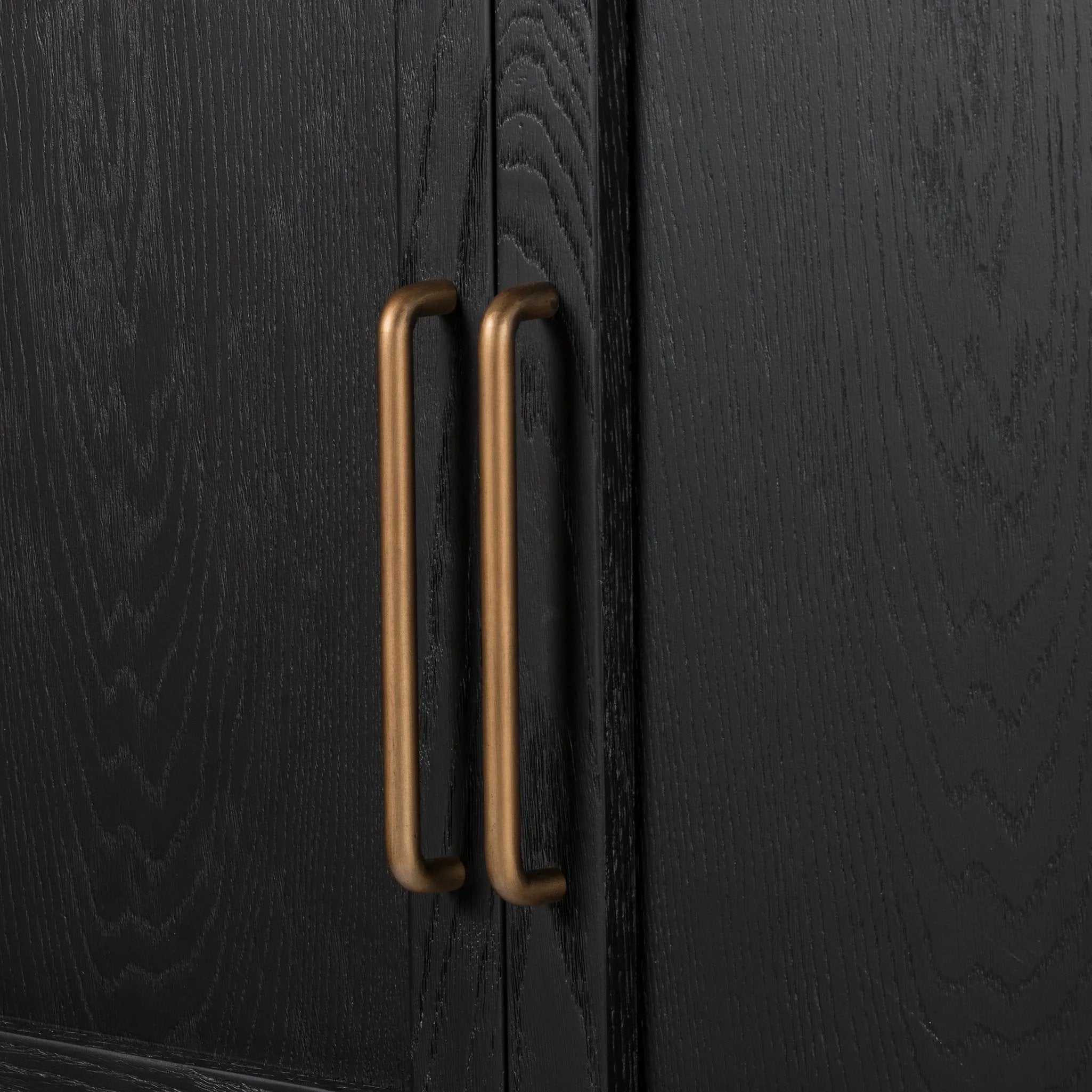 Featuring Tolle Drifted Matte Black Panel Door Cabinet by Four Hands at Amethyst Home. Store it in style. Beautifully shaped cabinetry in drifted matte black veneer features spacious interior shelving and recessed wood panel doors, ready for storing your treasures.Overall Dimensions: 38.00"w x 19.00"d x 84.00"hWeight : 169.75 lbsMaterials: Solid Oak, Oa. Amethyst Home provides interior design, new home construction design consulting, vintage area rugs, and lighting in the Newport Beach metro area.