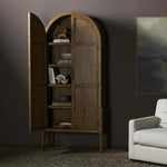 Featuring Tolle Drifted Oak Solid Panel Door Cabinet by Four Hands at Amethyst Home. Store it in style. Beautifully shaped cabinetry of solid oak with recessed wood panels and iron hardware in an antique brass finish. Features thick, spacious shelves to store kitchenware, favorite books and treasured objects.Overall Dimensions: 38.00"w x 19.00"d x 84.00"hW. Amethyst Home provides interior design, new home construction design consulting, vintage area rugs, and lighting in the Des Moines metro area.