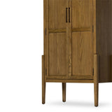 Featuring Tolle Drifted Oak Solid Panel Door Cabinet by Four Hands at Amethyst Home. Store it in style. Beautifully shaped cabinetry of solid oak with recessed wood panels and iron hardware in an antique brass finish. Features thick, spacious shelves to store kitchenware, favorite books and treasured objects.Overall Dimensions: 38.00"w x 19.00"d x 84.00. Amethyst Home provides interior design, new home construction design consulting, vintage area rugs, and lighting in the Newport Beach metro area.