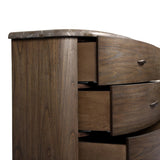 Mixed materials define this Art Deco-inspired dresser. Vein-rich marble in a warm cofffee color tops a sungkai case for a timeless yet modern look.As lovers of modern aesthetics at Amethyst, we love the warm modern inspired Tovae Dresser - Stained Saddle Brown Sungkai. Amethyst Home provides interior design, new home construction design consulting, vintage area rugs, and lighting in the Dallas metro area.