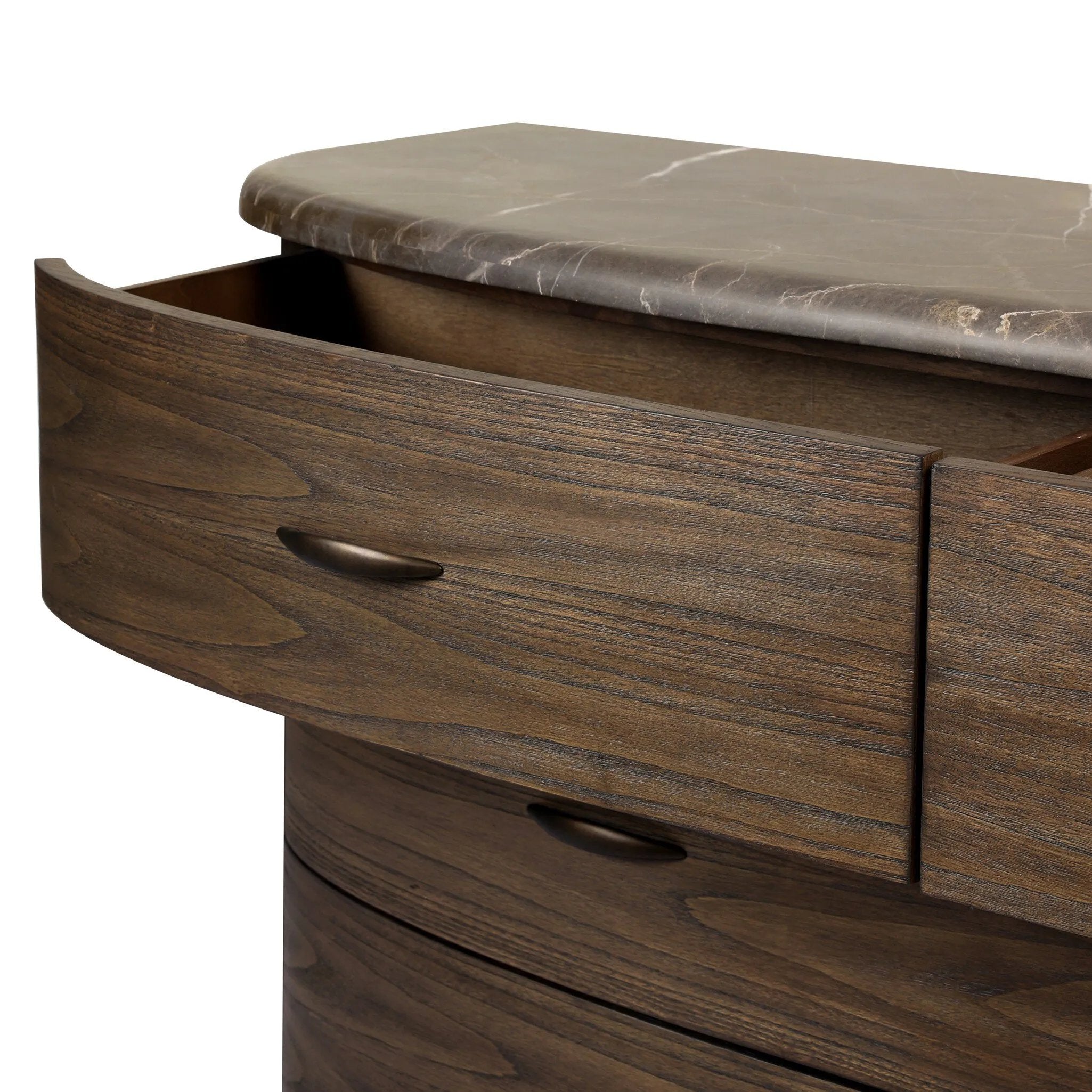 Mixed materials define this Art Deco-inspired dresser. Vein-rich marble in a warm cofffee color tops a sungkai case for a timeless yet modern look.As lovers of modern aesthetics at Amethyst, we love the warm modern inspired Tovae Dresser - Stained Saddle Brown Sungkai. Amethyst Home provides interior design, new home construction design consulting, vintage area rugs, and lighting in the Newport Beach metro area.