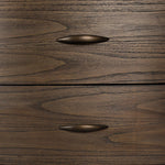 Mixed materials define this Art Deco-inspired dresser. Vein-rich marble in a warm cofffee color tops a sungkai case for a timeless yet modern look.As lovers of modern aesthetics at Amethyst, we love the warm modern inspired Tovae Dresser - Stained Saddle Brown Sungkai. Amethyst Home provides interior design, new home construction design consulting, vintage area rugs, and lighting in the San Diego metro area.