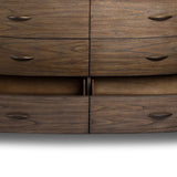 Mixed materials define this Art Deco-inspired dresser. Vein-rich marble in a warm cofffee color tops a sungkai case for a timeless yet modern look.As lovers of modern aesthetics at Amethyst, we love the warm modern inspired Tovae Dresser - Stained Saddle Brown Sungkai. Amethyst Home provides interior design, new home construction design consulting, vintage area rugs, and lighting in the Winter Garden metro area.