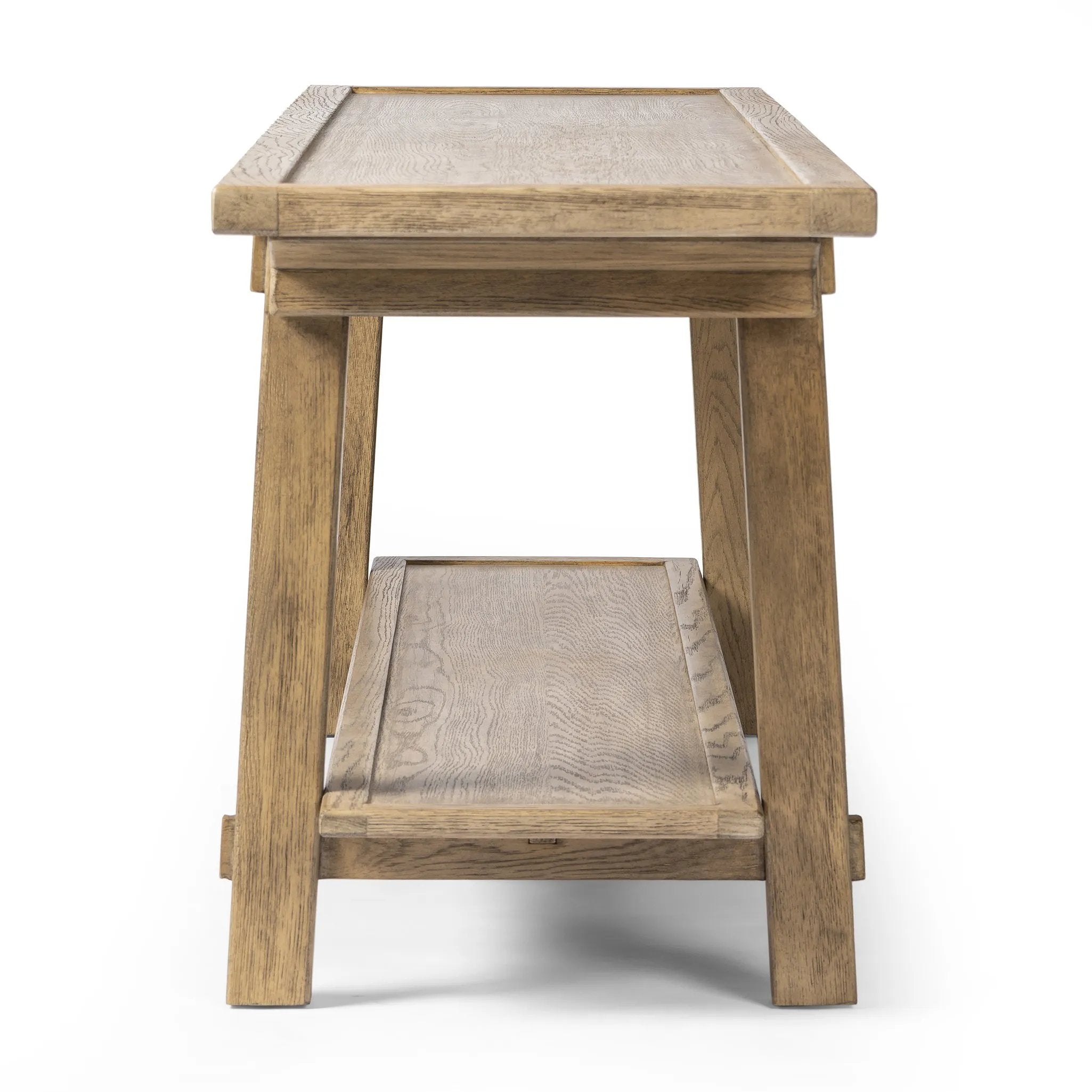 Featuring Trinity Distressed Light Oak Console Table by Four Hands at Amethyst Home. This Asian-inspired design made from light, distressed oak features mortise-and-tenon joinery, which connects protruding stretchers to sturdy legs. Lower shelving for bonus storage and display.Overall Dimensions: 78.00"w x 20.50"d x 27.00"hWeight : 96.78 lbsMaterials : Solid Oa. Amethyst Home provides interior design, new home construction design consulting, vintage area rugs, and lighting in the Omaha metro area.