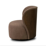 Great for smaller spaces or a reading nook, this petite slipper chair is backed with textured wood that folds into wings, cradling the head and shoulders for a little extra support. Features a 360-degree swivel base.As enthusiasts of organic modern design at Amethyst, we love the optimistic inspired Trisha Swivel Chair - Laughlin Cafe. Amethyst Home provides interior design, new home construction design consulting, vintage area rugs, and lighting in the Charlotte metro area.