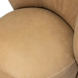 Great for smaller spaces or a reading nook, this petite slipper chair is wrapped in top-grain leather and backed with textured wood that folds into wings, cradling the head and shoulders for a little extra support. Features a 360-degree swivel base. Amethyst Home provides interior design, new home construction design consulting, vintage area rugs, and lighting in the Park City metro area.
