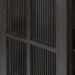 Long sliding doors with paper cord stripes inspired by Japanese teahouses bring a traditional look to this spacious cabinet. Made from oak in a smoked black finish, with a slightly oversized top.As lovers of luxe aesthetics at Amethyst, we love the optimistic inspired Tuscola Cabinet. Amethyst Home provides interior design, new home construction design consulting, vintage area rugs, and lighting in the Miami metro area.