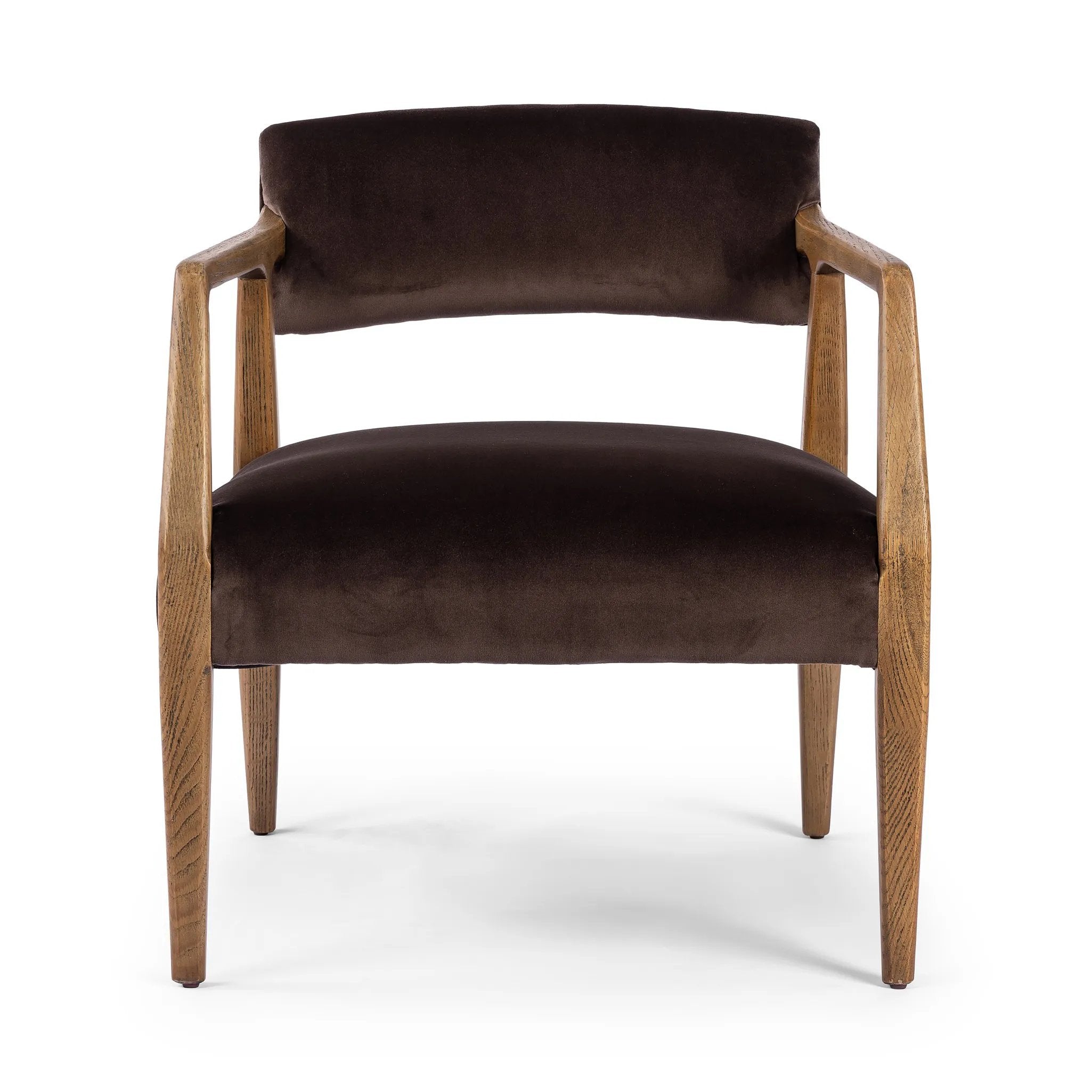 An angular frame of distressed nettlewood holds a deep seat and striking, low-slung back. Upholstered in a velvety cocoa cotton Amethyst Home provides interior design, new home construction design consulting, vintage area rugs, and lighting in the Houston metro area.