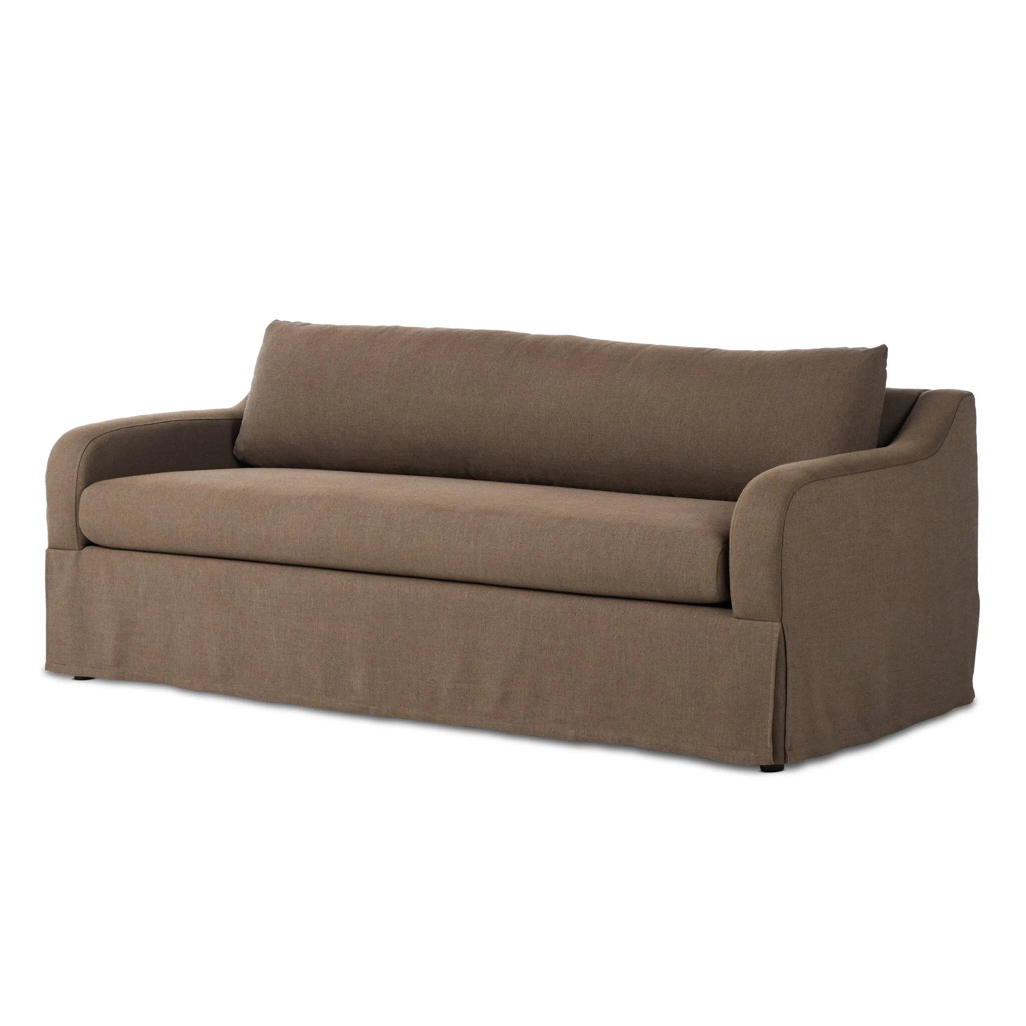 Meet the piece that can do it all. Coffee-colored fabric covers a long bench-style seat, while a concealed sleeper mechanism allows for easy pullout to transform this flexible piece into an extra bed. Curved slope arms finish into a fixed slipcover with kick-pleats at the front. Amethyst Home provides interior design, new home construction design consulting, vintage area rugs, and lighting in the Laguna Beach metro area.