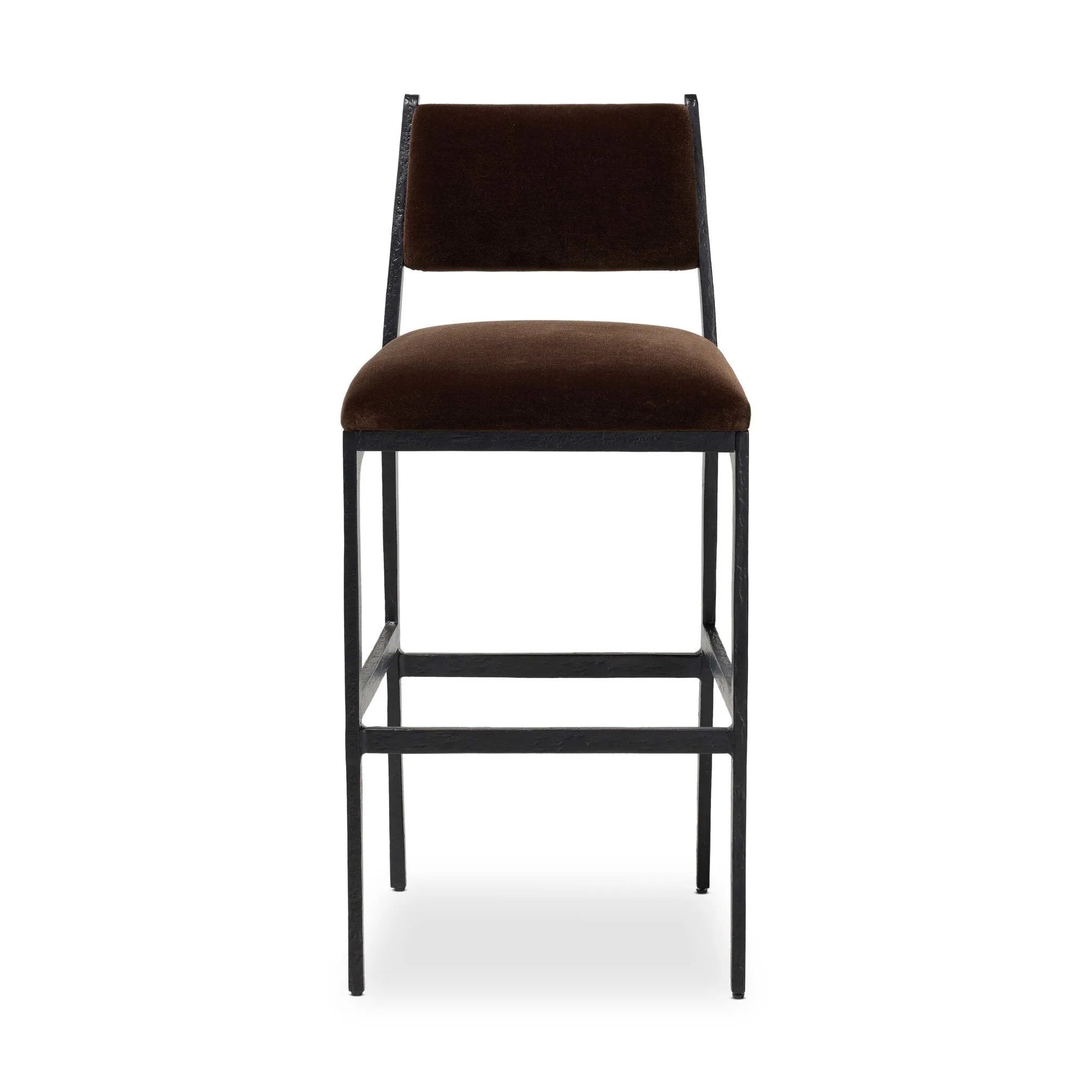 A metal frame with a tapered profile pairs with a velvety brown upholstered seat and back, striking balance in both scale in texture. Perfectly scaled for the counter.As lovers of wabi sabi design at Amethyst, we love the warm modern inspired Valeene Bar + Counter Stool. Amethyst Home provides interior design, new home construction design consulting, vintage area rugs, and lighting in the Houston metro area.
