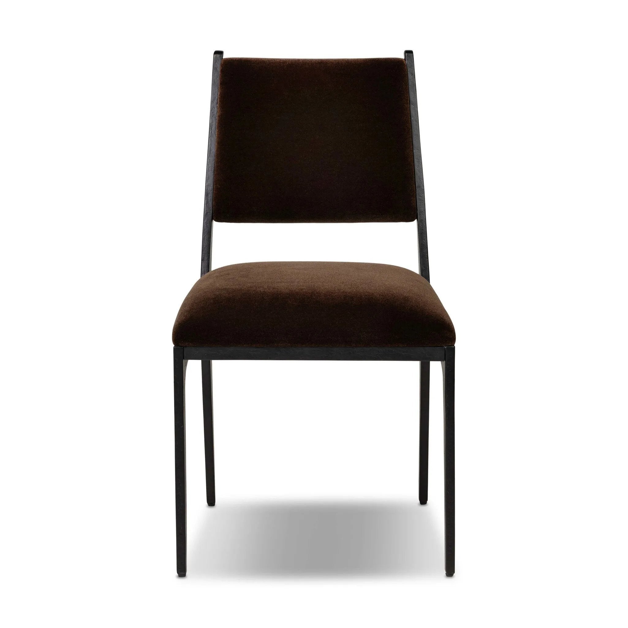 A metal frame with a tapered profile pairs with a velvety brown upholstered seat and back, striking balance in both scale in texture.As lovers of natural aesthetics at Amethyst, we love the warm modern inspired Valeene Dining Chair - Monte Chocolate. This item pairs well with other brands such as Four Hands and is perfect for loft homes Amethyst Home provides interior design, new home construction design consulting, vintage area rugs, and lighting in the Houston metro area.