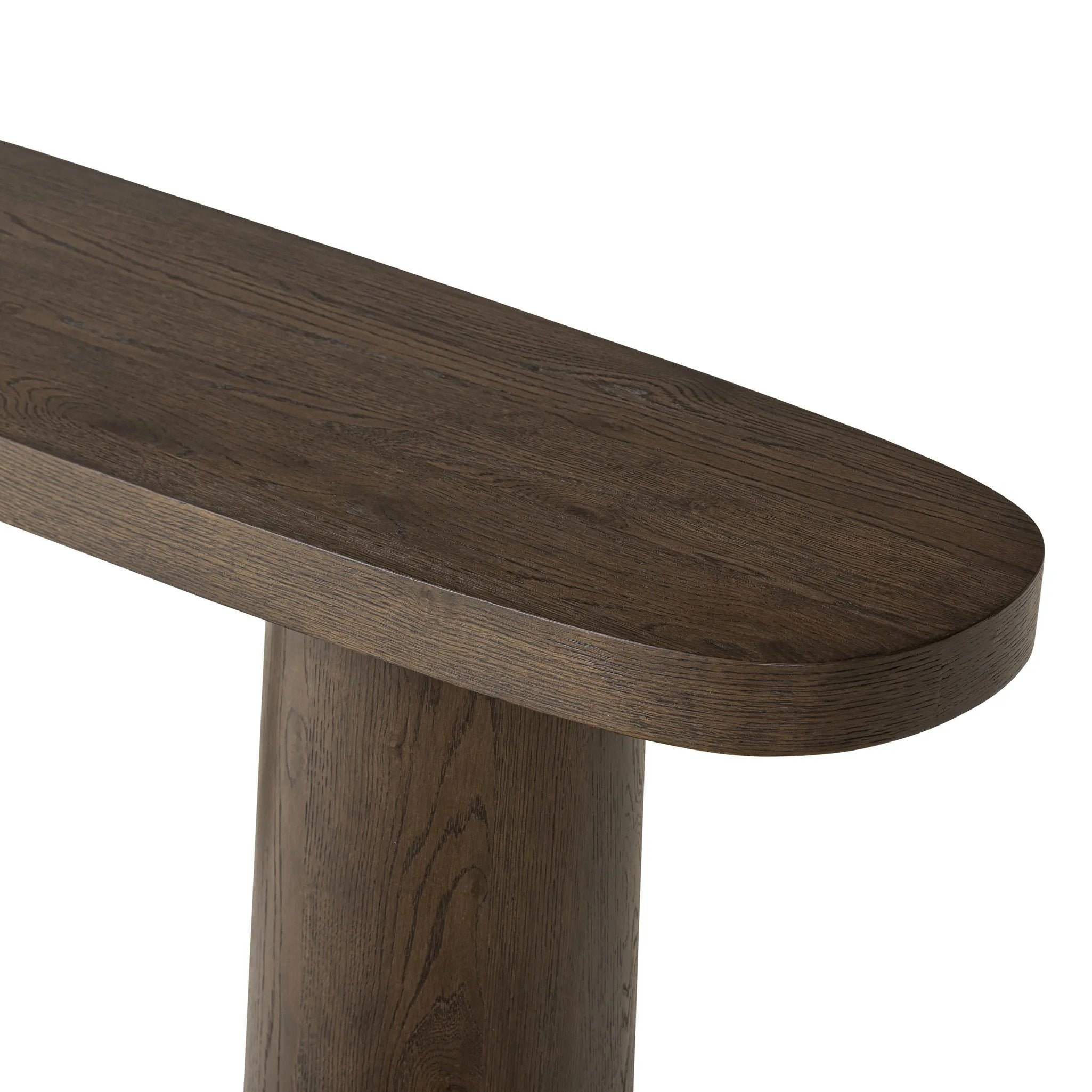 Featuring Valen Rustic Brown Oak Veneer Console Table by Four Hands at Amethyst Home. Made from rustic brown oak, an open-style console table is streamlined while not short on presence, with its exaggerated cylinder legs and polished pill-shaped top.Overall Dimensions: 78.00"w x 18.00"d x 32.00"hWeight : 99.21 lbsMaterials: Oak Veneer, Oak Plywood. Amethyst Home provides interior design, new home construction design consulting, vintage area rugs, and lighting in the Austin metro area.