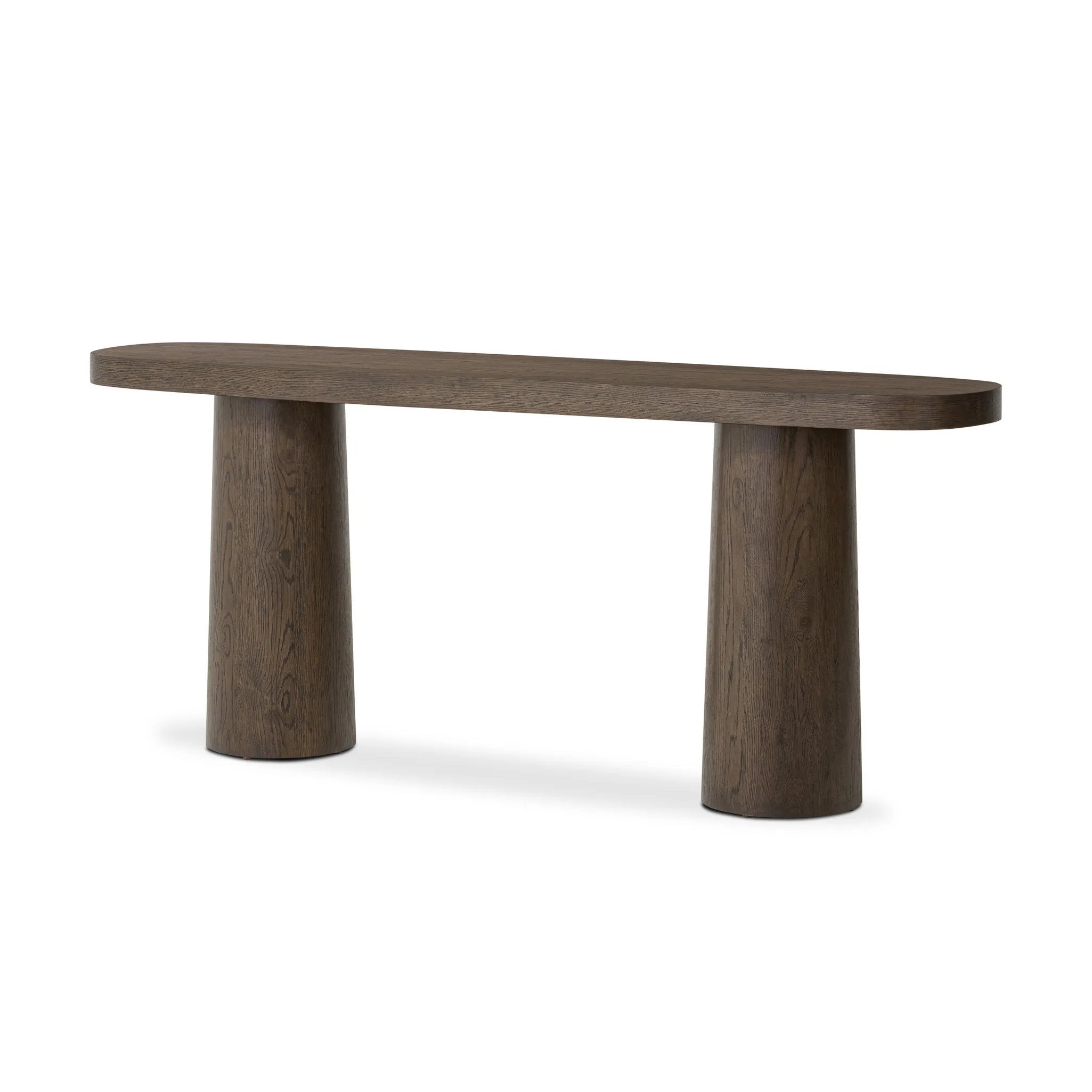 Featuring Valen Rustic Brown Oak Veneer Console Table by Four Hands at Amethyst Home. Made from rustic brown oak, an open-style console table is streamlined while not short on presence, with its exaggerated cylinder legs and polished pill-shaped top.Overall Dimensions: 78.00"w x 18.00"d x 32.00"hWeight : 99.21 lbsMaterials: Oak Veneer, Oak Plywood. Amethyst Home provides interior design, new home construction design consulting, vintage area rugs, and lighting in the Salt Lake City metro area.