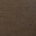Smooth and shapely with heavy proportions, exaggerated cylinder legs pair with a softened pill-shaped top, with subtly arched sides. Made from oak veneer with a rustic brown finish, for a warm, welcoming look Amethyst Home provides interior design, new home construction design consulting, vintage area rugs, and lighting in the Houston metro area.