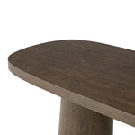 Smooth and shapely with heavy proportions, exaggerated cylinder legs pair with a softened pill-shaped top, with subtly arched sides. Made from oak veneer with a rustic brown finish, for a warm, welcoming look Amethyst Home provides interior design, new home construction design consulting, vintage area rugs, and lighting in the Monterey metro area.