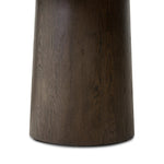 Smooth and shapely with heavy proportions, exaggerated cylinder legs pair with a softened pill-shaped top, with subtly arched sides. Made from oak veneer with a rustic brown finish, for a warm, welcoming look Amethyst Home provides interior design, new home construction design consulting, vintage area rugs, and lighting in the Nashville metro area.
