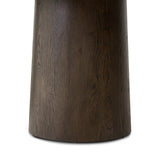 Smooth and shapely with heavy proportions, exaggerated cylinder legs pair with a softened pill-shaped top, with subtly arched sides. Made from oak veneer with a rustic brown finish, for a warm, welcoming look Amethyst Home provides interior design, new home construction design consulting, vintage area rugs, and lighting in the Nashville metro area.