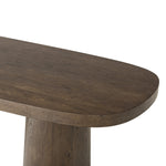 Smooth and shapely with heavy proportions, exaggerated cylinder legs pair with a softened pill-shaped top, with subtly arched sides. Made from oak veneer with a rustic brown finish, for a warm, welcoming look Amethyst Home provides interior design, new home construction design consulting, vintage area rugs, and lighting in the Omaha metro area.