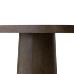 Smooth and shapely with heavy proportions, exaggerated cylinder legs pair with a softened pill-shaped top, with subtly arched sides. Made from oak veneer with a rustic brown finish, for a warm, welcoming look Amethyst Home provides interior design, new home construction design consulting, vintage area rugs, and lighting in the Portland metro area.