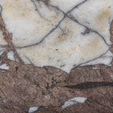 A study in sturdy materials. Distressed bronze aluminum supports a crescent tabletop of solid smoked marble. Unique demilune shape creates styling options, whether against the wall or next to a sofa.As lovers of natural design at Amethyst, we love the warm modern inspired Valentina End Table. Amethyst Home provides interior design, new home construction design consulting, vintage area rugs, and lighting in the Washington metro area.