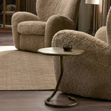 Featuring Vera Hammered Aged Brass End Table by Four Hands at Amethyst Home. A low-profile end table features a snake-like base finished in a hammered aged brass. Perfectly sized to keep your favorite drink or book within reach, to make your evening ritual a little smoother. Overall Dimensions: 16.00"w x 16.00"d x 18.75"h. Amethyst Home provides interior design, new home construction design consulting, vintage area rugs, and lighting in the Calabasas metro area.