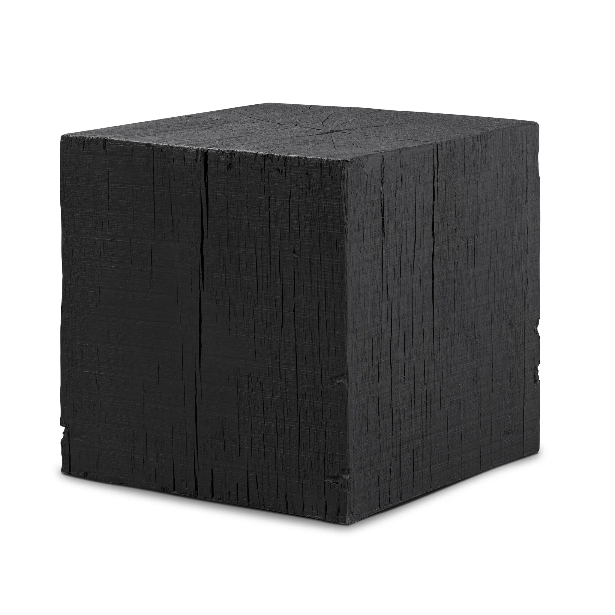 Ground any room with a style inspired by the beautiful simplicity of nature. Made of black-finished resin, the form for this special piece is molded from a tree trunk that's been cut into a square, then cast in resin to recreate the same  texture of the trunk, even the saw marks where it was cut — talk about a true statement piece Amethyst Home provides interior design, new home construction design consulting, vintage area rugs, and lighting in the Scottsdale metro area.