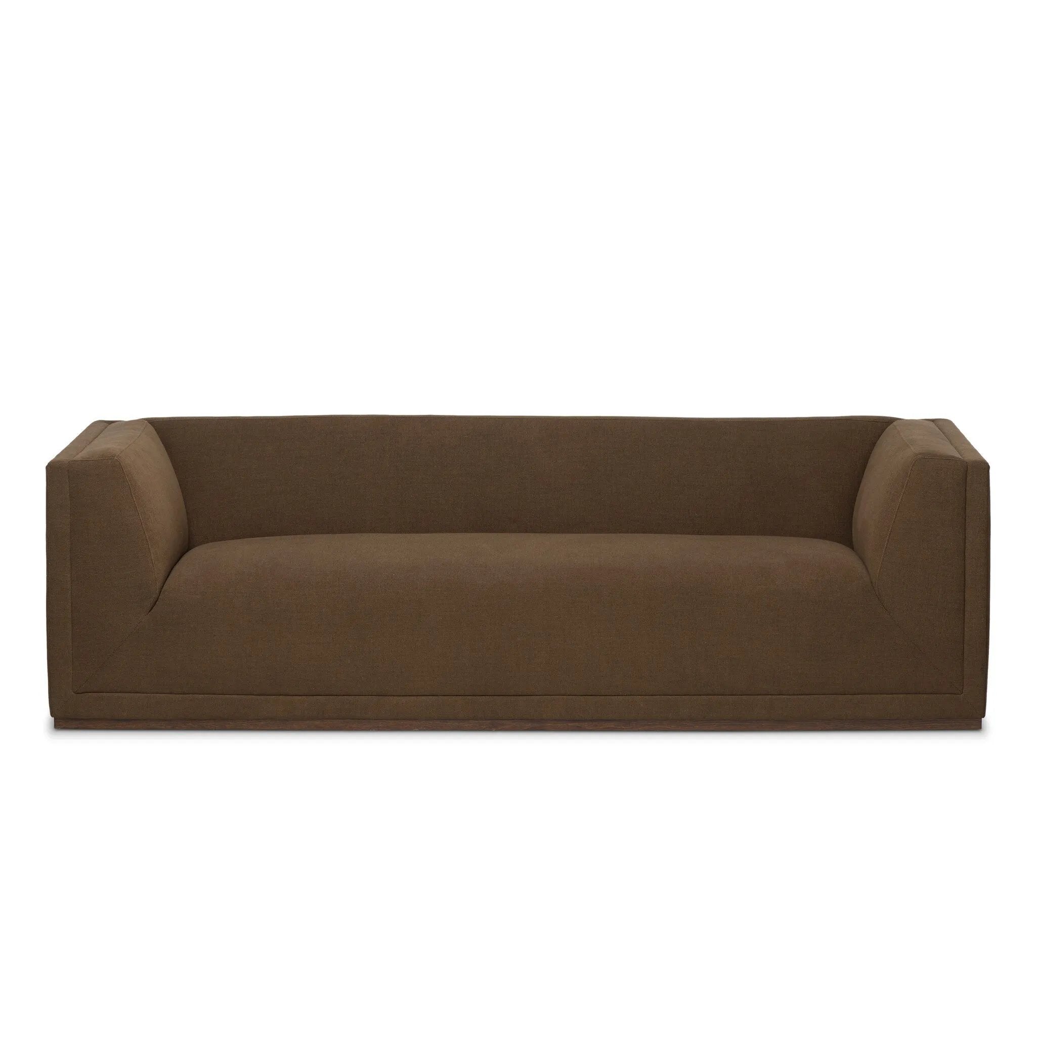 An inviting take on the classic tuxedo sofa, made for modern living. Celebrating mitered corners, for precision at every angle, and a layered, upholstered frame for a sharp, architectural look, the sofa rests on a wood plinth base. Tailored in the United States with thick pocket-seam cushions for unexpected comfort. Amethyst Home provides interior design, new home construction design consulting, vintage area rugs, and lighting in the Houston metro area.