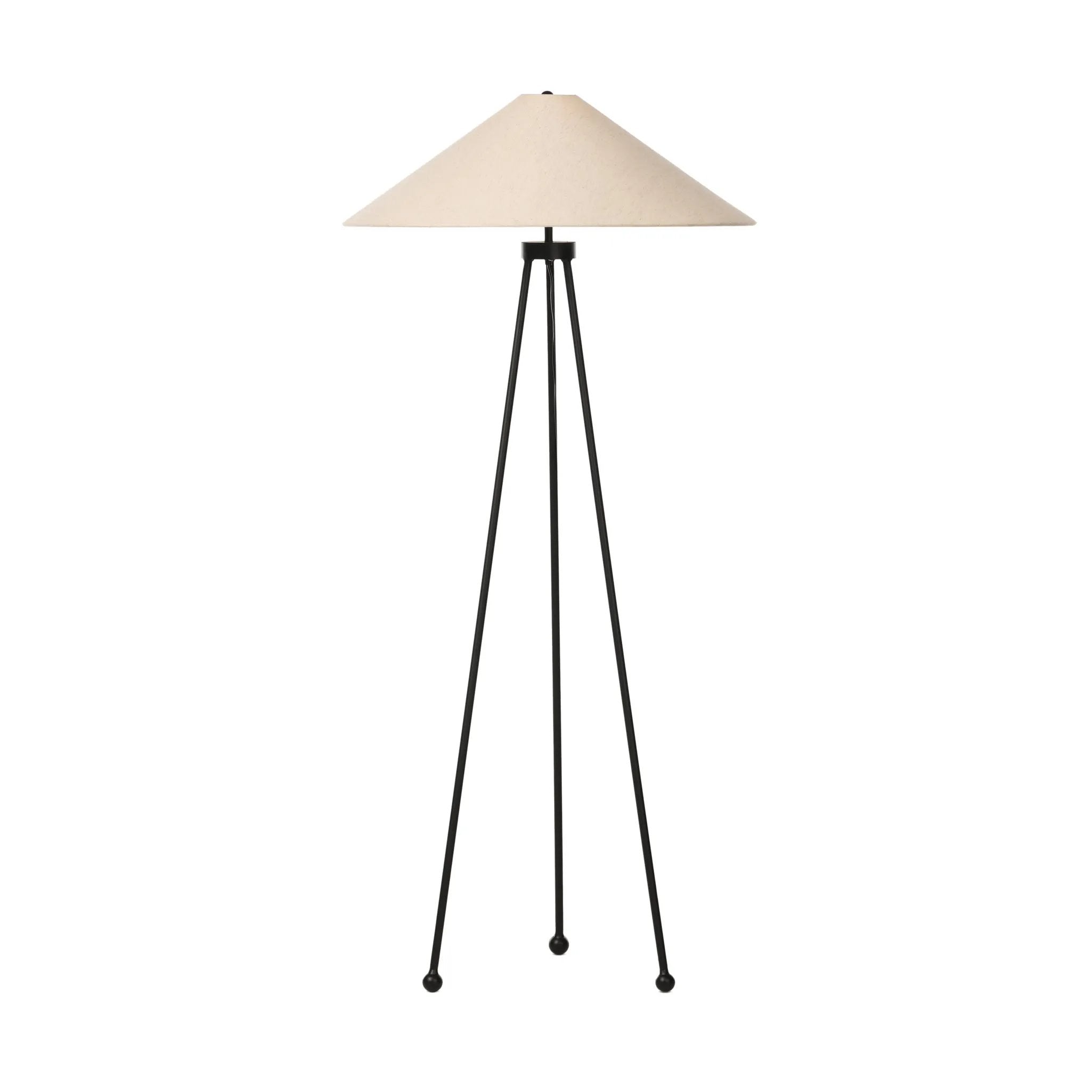 An exaggeratedly slim, airy tripod base of black-finished iron supports a light beige shade of 100% cotton, for a classic look with contrast Amethyst Home provides interior design, new home construction design consulting, vintage area rugs, and lighting in the Calabasas metro area.