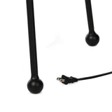 An exaggeratedly slim, airy tripod base of black-finished iron supports a light beige shade of 100% cotton, for a classic look with contrast Amethyst Home provides interior design, new home construction design consulting, vintage area rugs, and lighting in the Miami metro area.