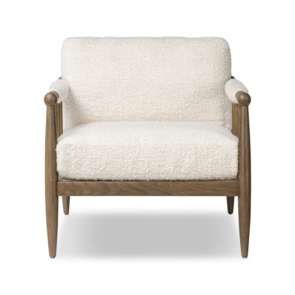 Featuring Warren Ivan Snow Chair by Four Hands at Amethyst Home. A classic silhouette through a contemporary lens. Framed in vintage oak, this accent chair features tapered legs, spindles along the arms and bauble details. Finished in Turkish-made upholstery with a heavy pile that blends brushed, pulled and boucle styles, it's woven into a subtle linear pattern. Amethyst Home provides interior design, new home construction design consulting, vintage area rugs, and lighting in the Omaha metro area.