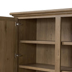 Featuring Whitman Worn Oak Cabinet by Four Hands at Amethyst Home. Crafted from worn oak for a found, heritage look, naturally beautiful cabinetry offers generous storage space by way of roomy shelving and four lower drawers.Overall Dimensions: 64.00"w x 19.00"d x 73.75"hWeight : 311.95 lbsMaterials: Solid Oak, Thick Oak Veneer. Amethyst Home provides interior design, new home construction design consulting, vintage area rugs, and lighting in the Charlotte metro area.