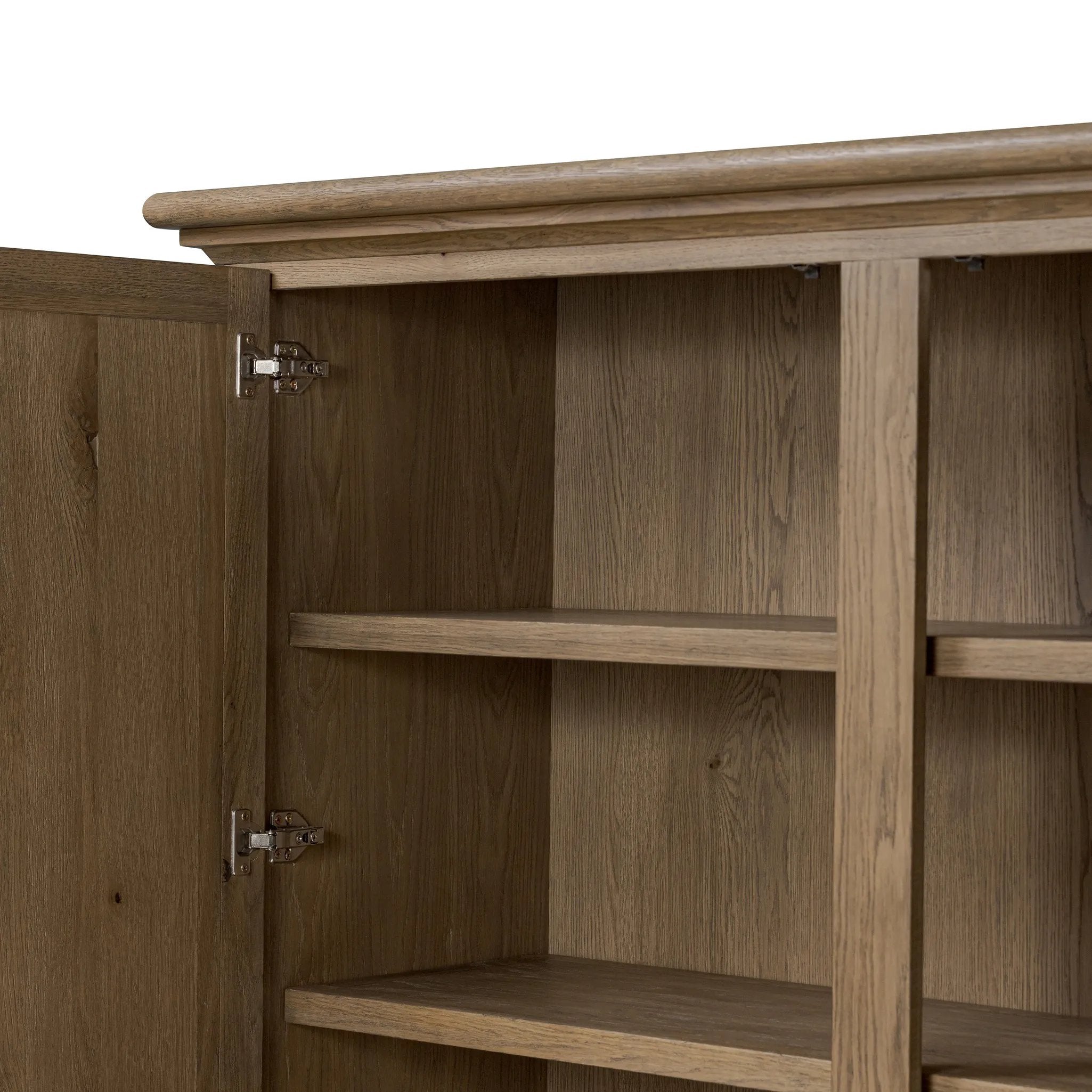 Featuring Whitman Worn Oak Cabinet by Four Hands at Amethyst Home. Crafted from worn oak for a found, heritage look, naturally beautiful cabinetry offers generous storage space by way of roomy shelving and four lower drawers.Overall Dimensions: 64.00"w x 19.00"d x 73.75"hWeight : 311.95 lbsMaterials: Solid Oak, Thick Oak Veneer. Amethyst Home provides interior design, new home construction design consulting, vintage area rugs, and lighting in the Charlotte metro area.