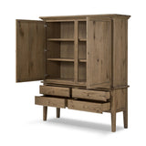 Featuring Whitman Worn Oak Cabinet by Four Hands at Amethyst Home. Crafted from worn oak for a found, heritage look, naturally beautiful cabinetry offers generous storage space by way of roomy shelving and four lower drawers.Overall Dimensions: 64.00"w x 19.00"d x 73.75"hWeight : 311.95 lbsMaterials: Solid Oak, Thick Oak Veneer. Amethyst Home provides interior design, new home construction design consulting, vintage area rugs, and lighting in the Newport Beach metro area.