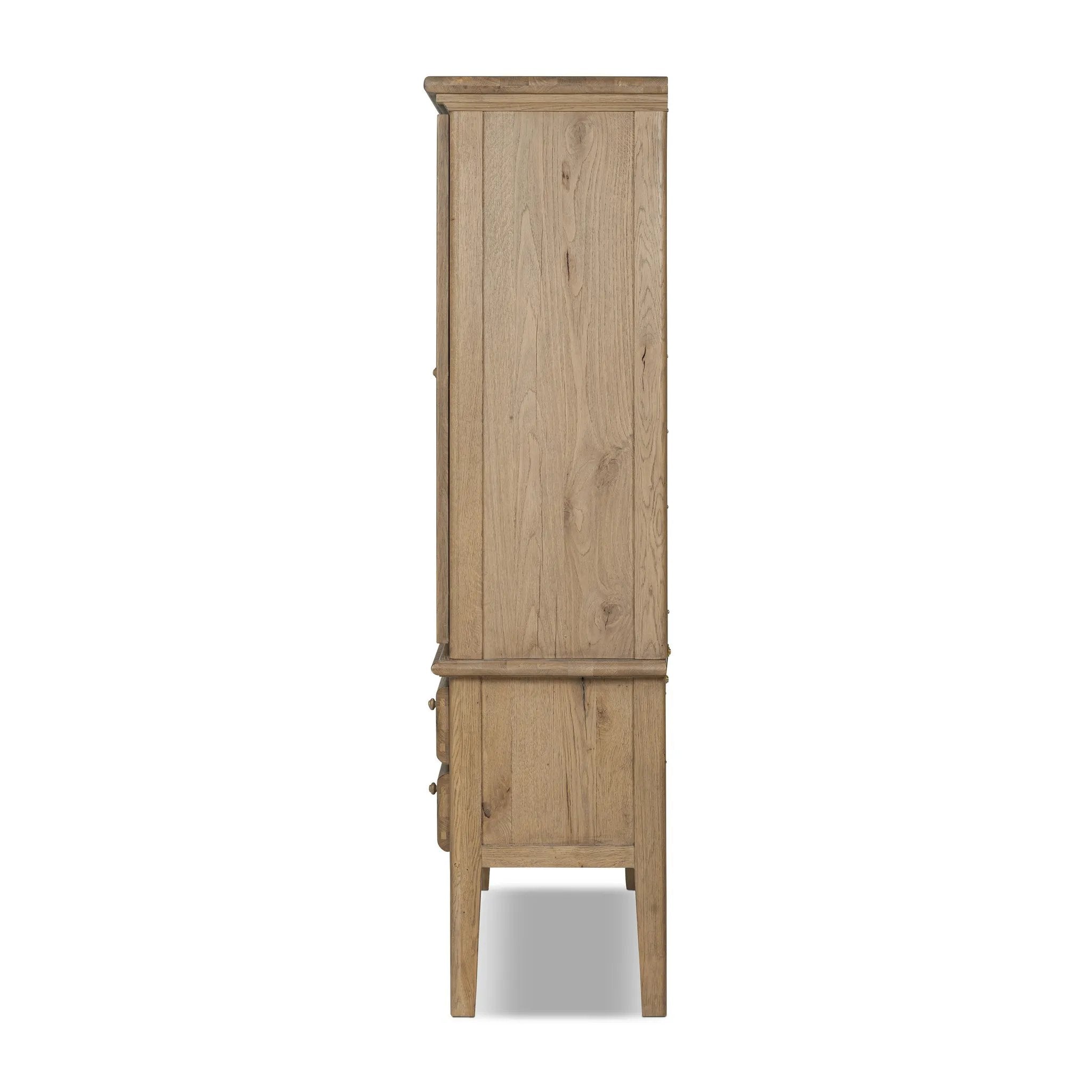 Featuring Whitman Worn Oak Cabinet by Four Hands at Amethyst Home. Crafted from worn oak for a found, heritage look, naturally beautiful cabinetry offers generous storage space by way of roomy shelving and four lower drawers.Overall Dimensions: 64.00"w x 19.00"d x 73.75"hWeight : 311.95 lbsMaterials: Solid Oak, Thick Oak Veneer. Amethyst Home provides interior design, new home construction design consulting, vintage area rugs, and lighting in the Washington metro area.