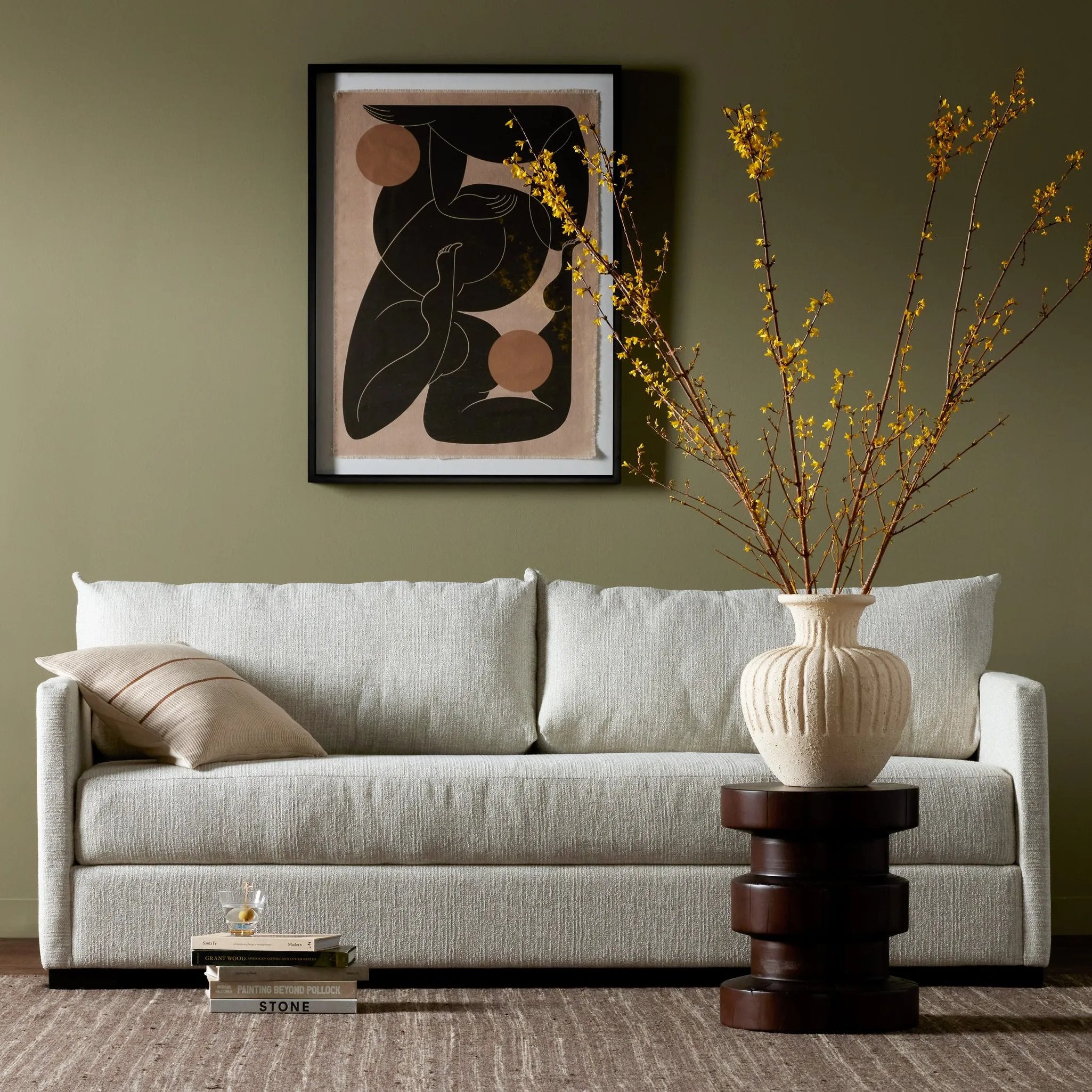A simple, stylish silhouette redefines the classic sofa bed. With knife-edge pillows and high-performance upholstery, a discreetly concealed sleeper mechanism allows for one-step pullout with ultimate ease. Unfolded, sofa cushions form a comfortable Queen-size bed, ready to welcome overnight guests or make movie nights a little comfier. Amethyst Home provides interior design, new home construction design consulting, vintage area rugs, and lighting in the Kansas City metro area.