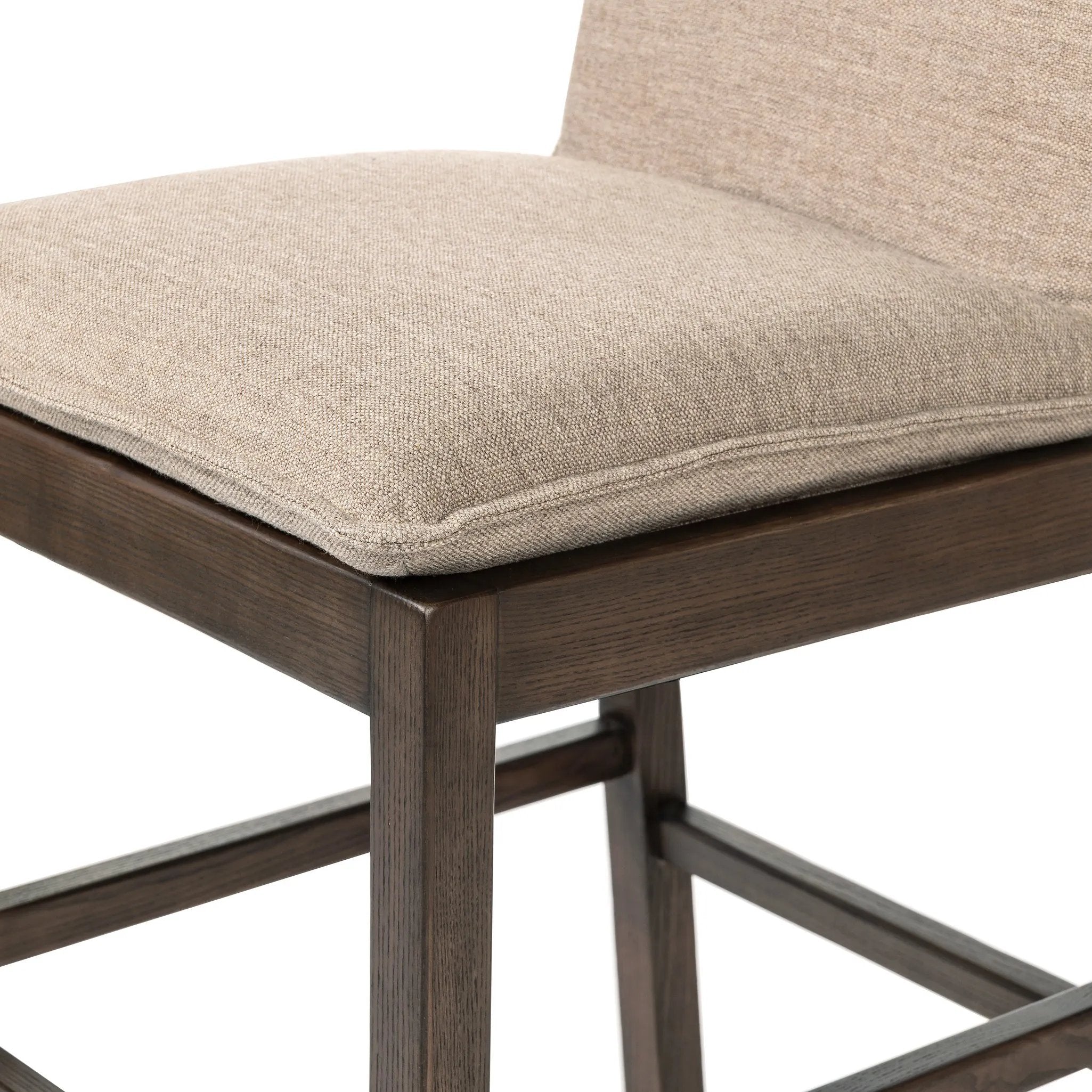 Featuring Wilmington Alcala Fawn Counter Stool by Four Hands at Amethyst Home. Almond-finished parawood frames cushioned seating upholstered in high-performance fabric. Perfectly sized for the counter.Overall Dimensions: 20.00"w x 25.50"d x 37.00"hWeight : 24.69 lbsMaterials: 70% Polyester, 20% Viscose (Rayon), 10% Flax/Linen, Solid Oak, Top Grain Leathe. Amethyst Home provides interior design, new home construction design consulting, vintage area rugs, and lighting in the Laguna Beach metro area.