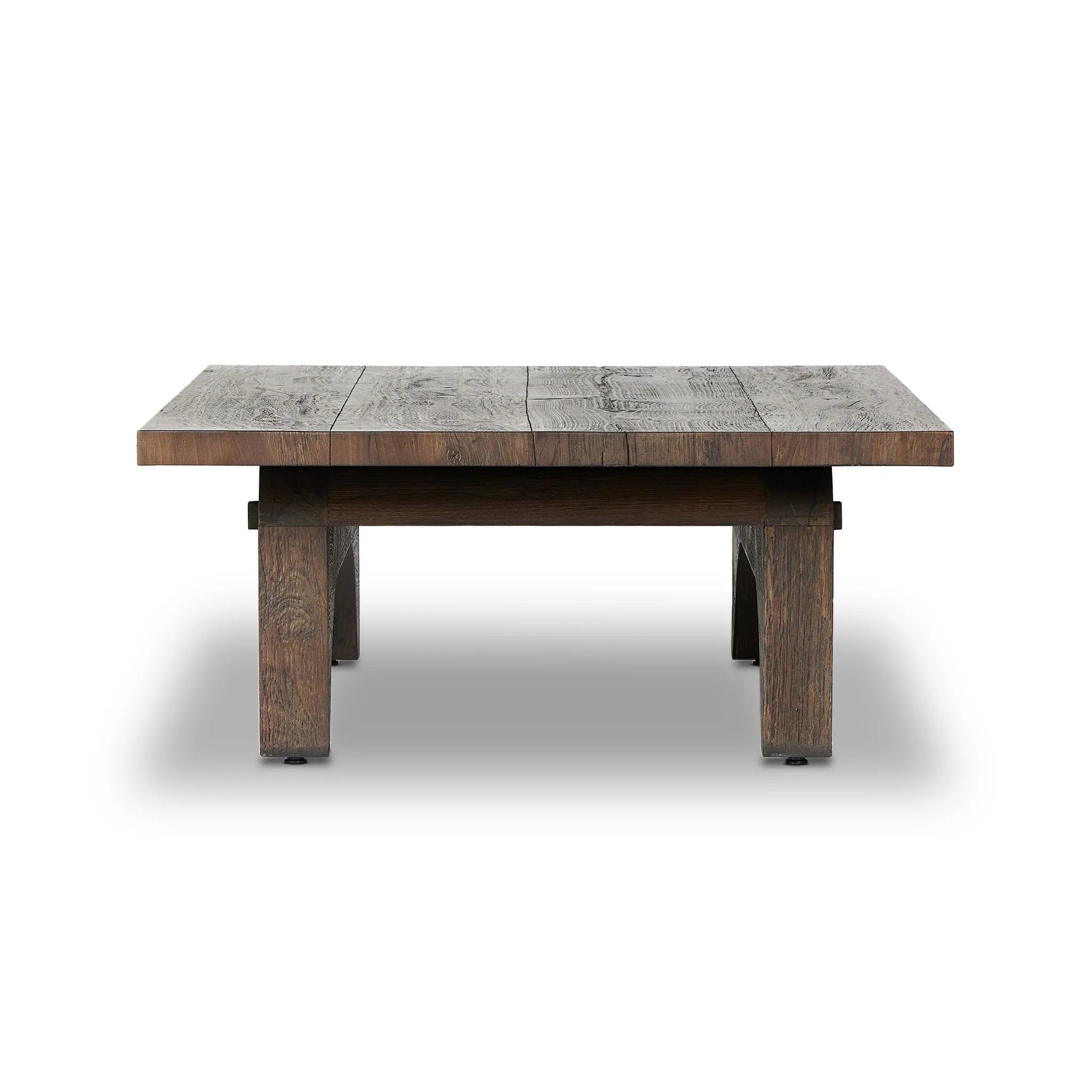Smoked alder shapes a character-rich coffee table with Wabi Sabi vibes. Joinery pulls through stretchers, with groove detailing on legs, for an artisan feel Amethyst Home provides interior design, new home construction design consulting, vintage area rugs, and lighting in the Charlotte metro area.