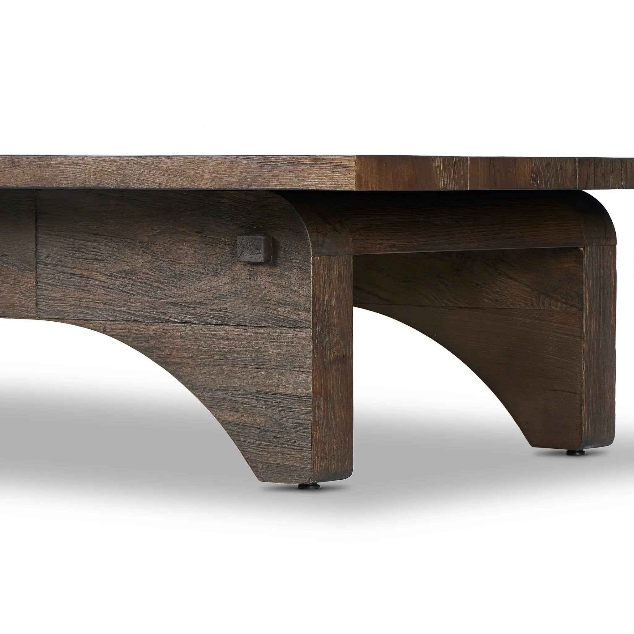 Smoked alder shapes a character-rich coffee table with Wabi Sabi vibes. Joinery pulls through stretchers, with groove detailing on legs, for an artisan feel Amethyst Home provides interior design, new home construction design consulting, vintage area rugs, and lighting in the Newport Beach metro area.