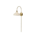 Slim and curved, a swan-neck arm supports a bell-shaped linen shade with brass boning, updating a traditional lighting look. This plug-in sconce design brings warm illumination to any space while discreet cord management keeps the look polished. Ideal for crafting warm, inviting reading corners or bedside ambiance Amethyst Home provides interior design, new home construction design consulting, vintage area rugs, and lighting in the Winter Garden metro area.