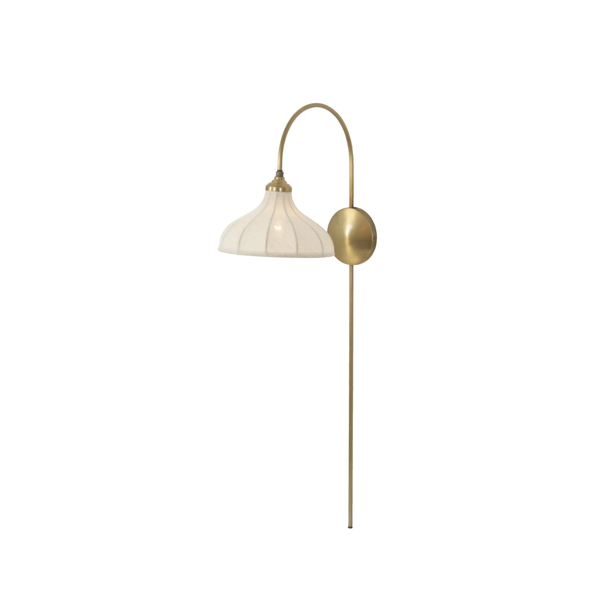 Slim and curved, a swan-neck arm supports a bell-shaped linen shade with brass boning, updating a traditional lighting look. This plug-in sconce design brings warm illumination to any space while discreet cord management keeps the look polished. Ideal for crafting warm, inviting reading corners or bedside ambiance Amethyst Home provides interior design, new home construction design consulting, vintage area rugs, and lighting in the Winter Garden metro area.