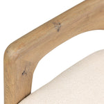 Striking from every view. This statement-making chair combines beautiful natural oak in tripod form with high-performance fabric. The cantilever design, with a wide plank back and sloping arms, form an eye-catching silhouette for the floating seat and overflowing back cushion. Amethyst Home provides interior design, new home construction design consulting, vintage area rugs, and lighting in the Newport Beach metro area.