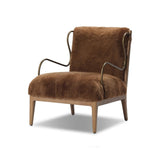 Bring the soul of a vintage find to your living room with this artfully updated accent chair. Solid ash legs and swooping iron arms give it a curated look, while a plush seat ensure comfort. Wrapped in cozy shearling to make any room feel instantly inviting. Amethyst Home provides interior design, new home construction design consulting, vintage area rugs, and lighting in the Washington metro area.