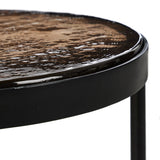 Smoky brown glass-topped table with slim, tapered matte black metal frames for a sleek, modern look. Part of a nesting set, can be used alone or paired with its larger counterpart.Collection: Marlo Amethyst Home provides interior design, new home construction design consulting, vintage area rugs, and lighting in the Portland metro area.