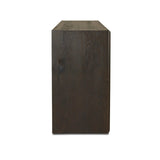 Store favorite table linens and serveware in an oak sideboard with a unique float-like appearance. A thick base doubles as bonus shelving, with inserted waterfall framing lifting up the full case. Finished in a smoked black to showcase gorgeous wood character. Amethyst Home provides interior design, new home construction design consulting, vintage area rugs, and lighting in the Scottsdale metro area.