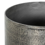 Futuristic-like metal with an antiqued finish, shaped into a cast planter with textural movement that catches the light. Safe for any space, indoor or out. Cover or store indoors during inclement weather and when not in use.As enthusiasts of natural style at Amethyst, we love the designer inspired Zavia Metal Planter - Raw Antique Nickel. Amethyst Home provides interior design, new home construction design consulting, vintage area rugs, and lighting in the Des Moines metro area.