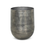 Futuristic-like metal with an antiqued finish, shaped into a cast planter with textural movement that catches the light. Safe for any space, indoor or out. Cover or store indoors during inclement weather and when not in use.As enthusiasts of natural style at Amethyst, we love the designer inspired Zavia Metal Planter - Raw Antique Nickel. Amethyst Home provides interior design, new home construction design consulting, vintage area rugs, and lighting in the Kansas City metro area.
